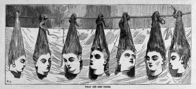 Scene from a late 19th century novelty tableau. The heads of Bluebeard's murdered wives hang behind a curtain, ready to be revealed to a horrified audience.