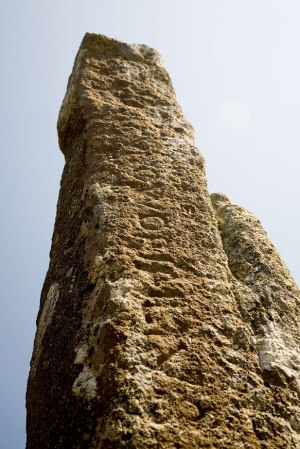 The "Tristan Stone", with its badly worn inscription – a sixth century granite monument outside Fowey in Cornwall.
