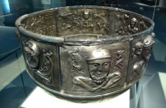 The Gundestrup Cauldron, the largest known example of Iron Age silverware, was deposited in a Danish bog about a century before the time of Christ. It bears images of gods and sacrifice.