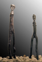 A pair of idols, one male, the other female, found at Ostholstein in Schleswig-Holstein and dating to 400 B.C. The male figure is 9 feet [2.75m] tall.